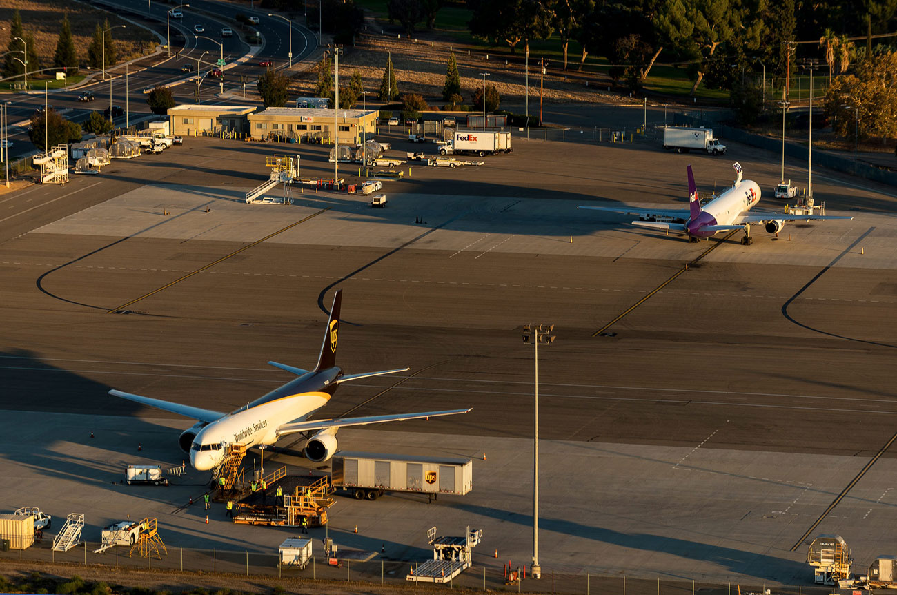 Photo from the sky showing a FedEx and UPS aircraft on the cargo ramp at Fresno Airport