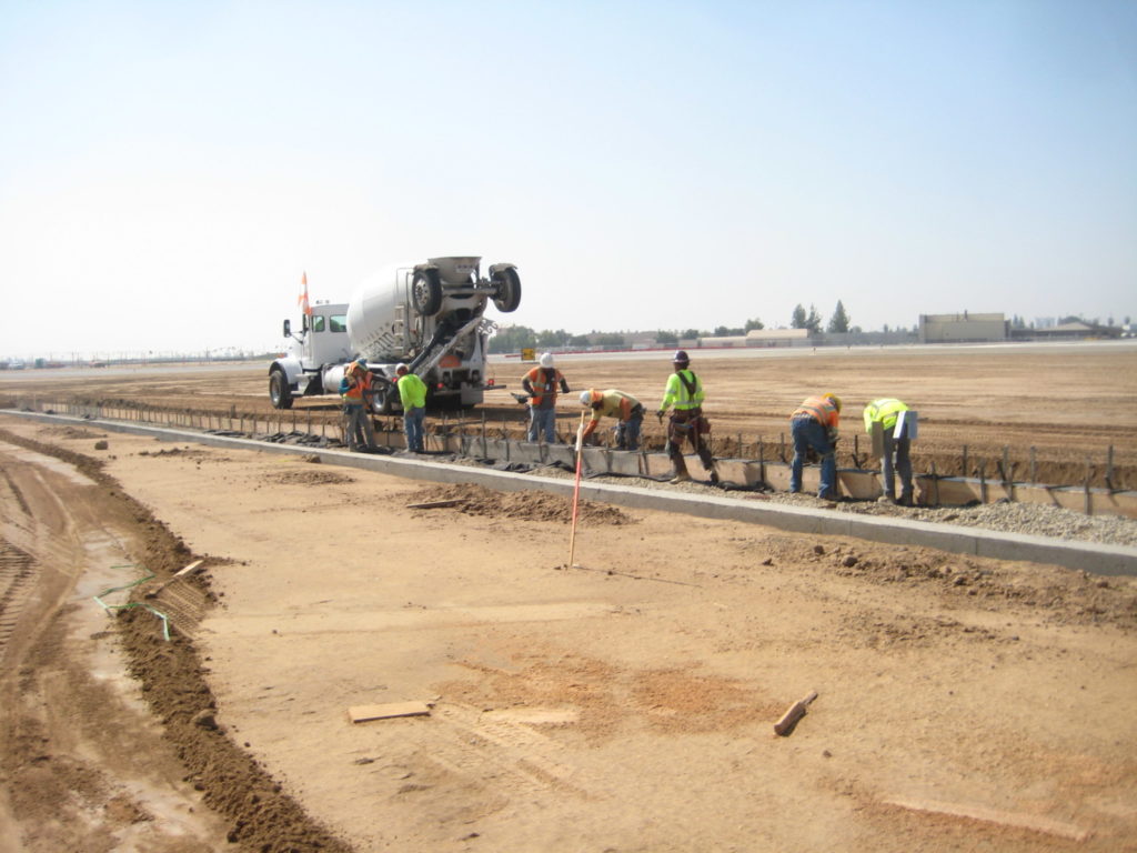 Taxiway C gravel drainage trench construction