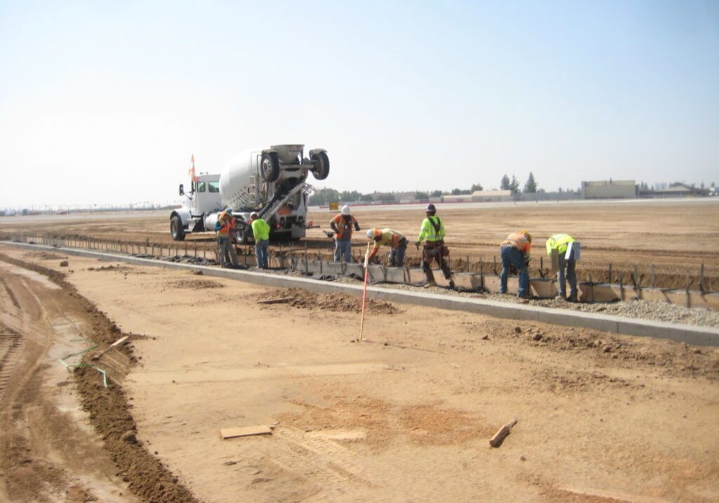 Taxiway C gravel drainage trench construction